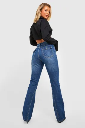Mid Rise Twisted Seam Cargo Pocket Flared Jeans